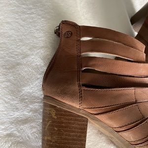 Healed booties with cutout